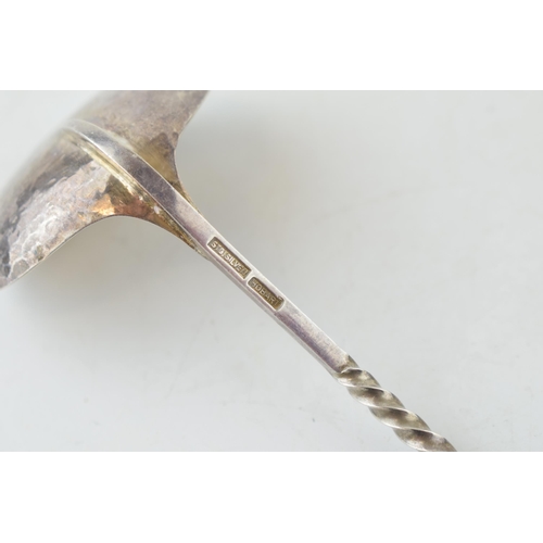 294 - Hobart sterling silver spoon with hammered bowl, twist design to handle and swirling finial, 26.3 gr... 