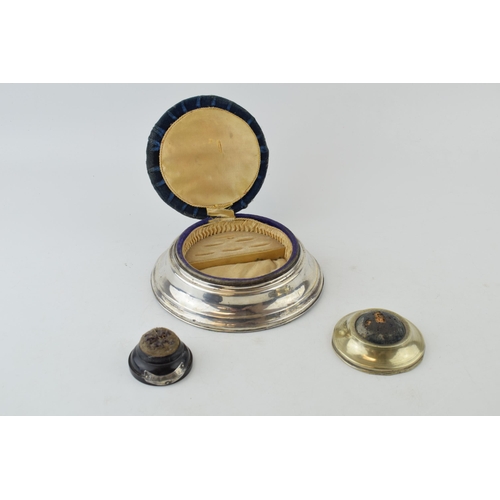 299 - Three hat pin holders to include a silver example, hallmarked Birmingham 1984 with blue velvet cushi... 