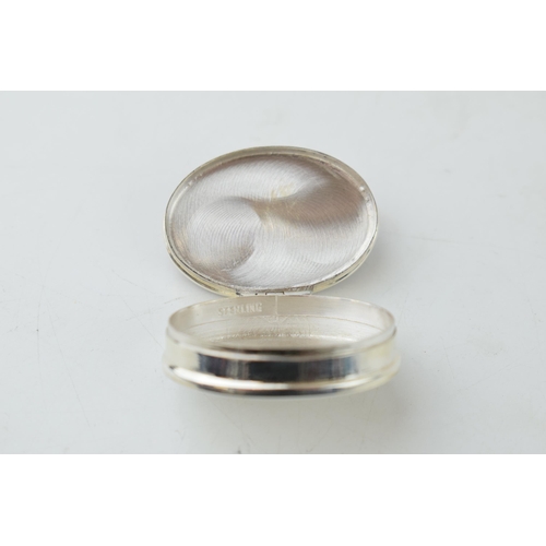 307 - Sterling silver pill box with pointer enamel insert, 3.5cm wide, modern.