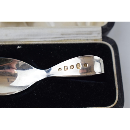 313 - Two Christening spoons, (One boxed) Hallmarked Birmingham and Sheffield. (2) Weight 34.5 grams.