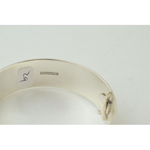 331 - Hallmarked heavy silver wide bangle, Birmingham 1974, 44.3 grams, with engineered decoration, 19mm w... 