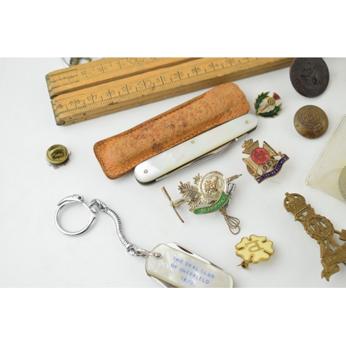 333 - A good collection of small items to include mother of pearl handled Sheffield penknife in leather ca... 