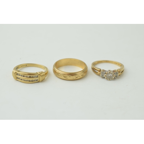 334 - Three 9ct yellow gold ladies rings to include a wedding band, a diamond set ring together with anoth... 