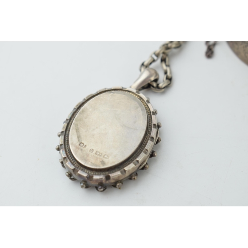 336 - A collection of Victorian silver items to include a bangle a locket with bird motif on chain and a r... 