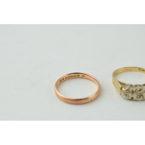 352 - Two 9ct yellow gold rings to include a wedding band (size M) together with a yellow gold and diamond... 