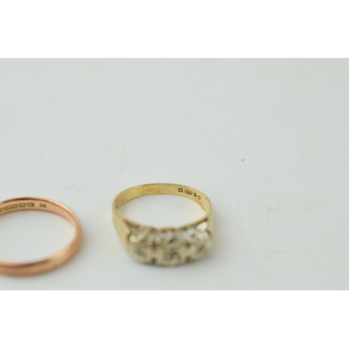 352 - Two 9ct yellow gold rings to include a wedding band (size M) together with a yellow gold and diamond... 