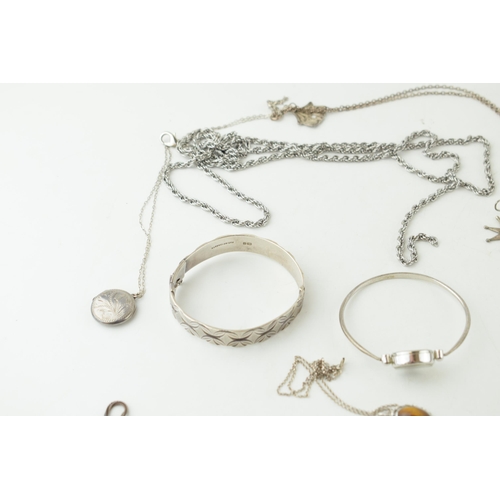 366 - A collection of silver items to include a bangle, pendant and necklace (41.5 grams) together with co... 