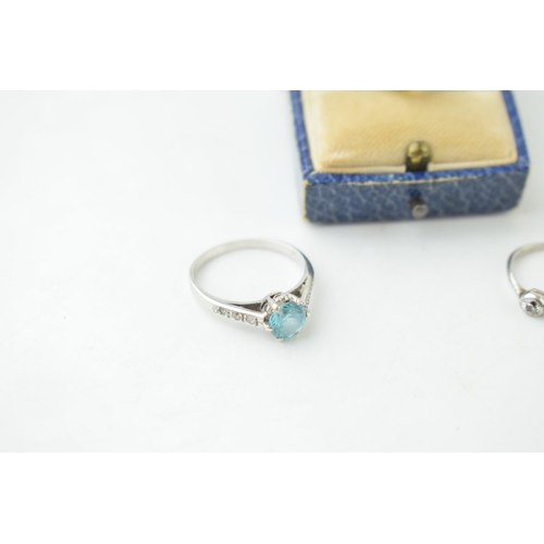 367 - A diamond and white metal ring, 9ct gold and blue topaz (or paste) together with a 9ct and silver ma... 