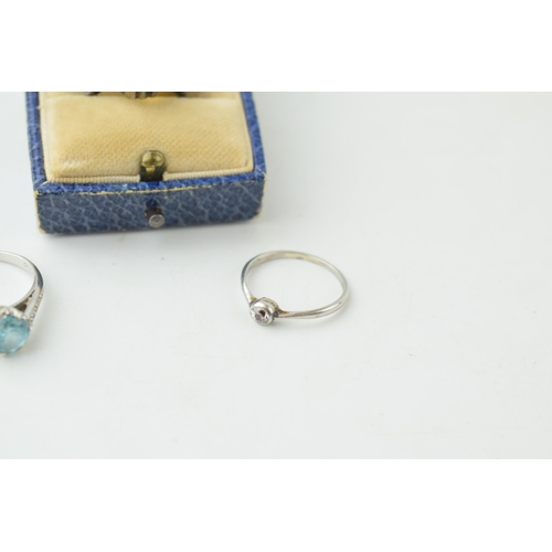 367 - A diamond and white metal ring, 9ct gold and blue topaz (or paste) together with a 9ct and silver ma... 