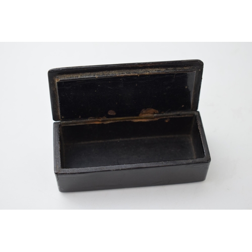 396 - A pair of vintage snuff boxes to include a brass engraved example 'take a pinch and welcome' with an... 