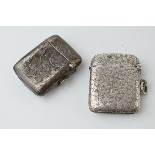 402 - A pair of silver vesta cases, Chester 1904 and Birmingham 1896, 53.6 grams combined.