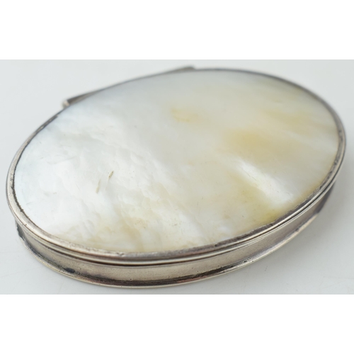 A Georgian or later silver and mother of pearl oval hinged box, 8cm diameter.