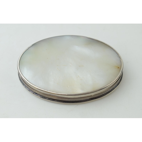 404 - A Georgian or later silver and mother of pearl oval hinged box, 8cm diameter.