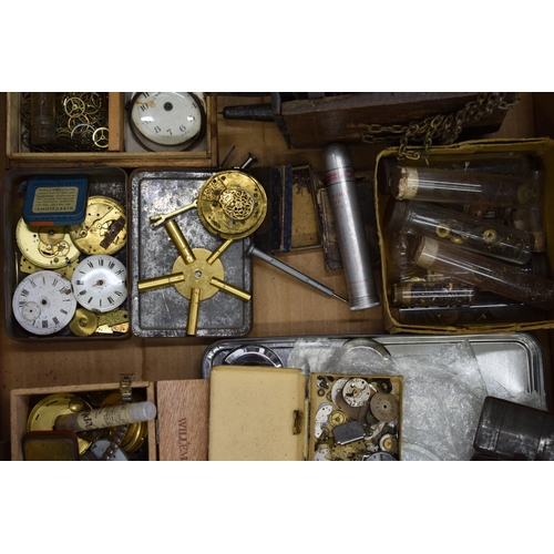 413 - A mixed collection of clock and watch spare parts to include movements, clock key, tools and various... 