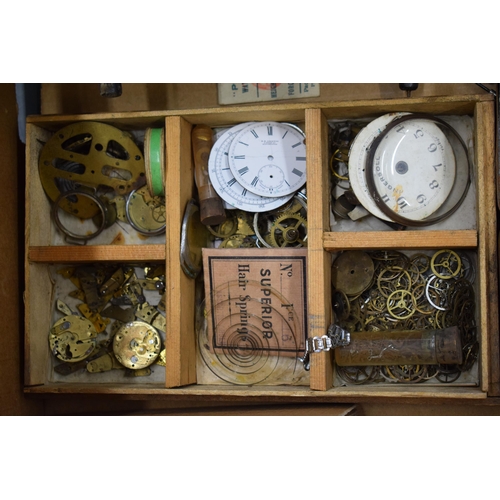 413 - A mixed collection of clock and watch spare parts to include movements, clock key, tools and various... 