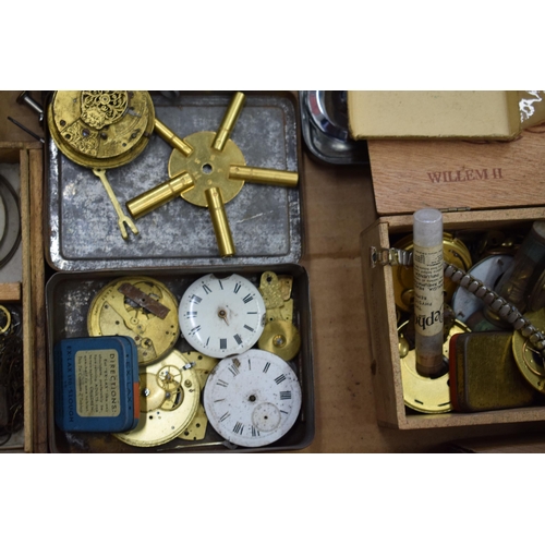 413 - A mixed collection of clock and watch spare parts to include movements, clock key, tools and various... 