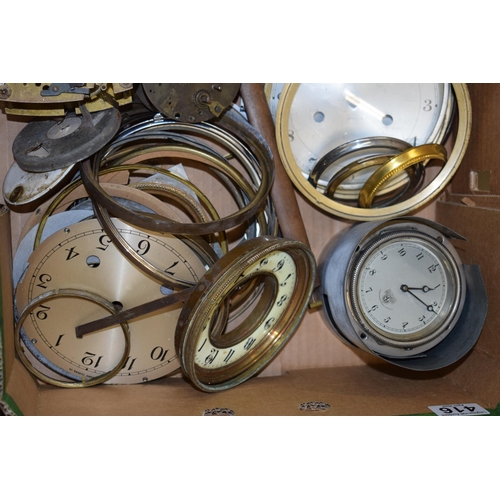 416 - A mixed collection of clock spare parts to include movements, chimes, cases and various similar item... 