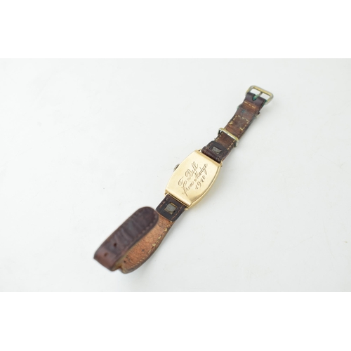 418 - A gentleman's 9ct gold wristwatch inscribed to back of case '1940'. Rectangular dial with subsidiary... 