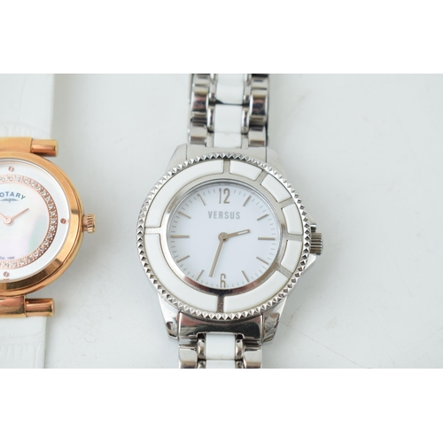 423 - A collection of ladies fashion watches to include examples by manufacturers D&G (2), Versus, Rotary ... 