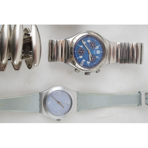 424 - A collection of Swatch watches to include stainless steel chronometer and date models together with ... 