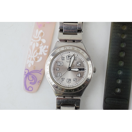 424 - A collection of Swatch watches to include stainless steel chronometer and date models together with ... 