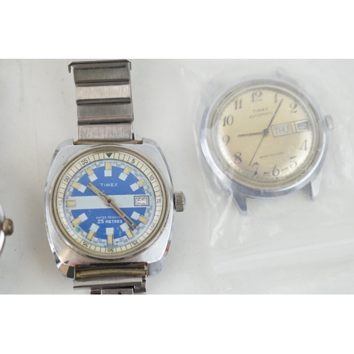 438 - A collection of vintage gentlemen's Timex wristwatches, to include complete watches and a movement. ... 