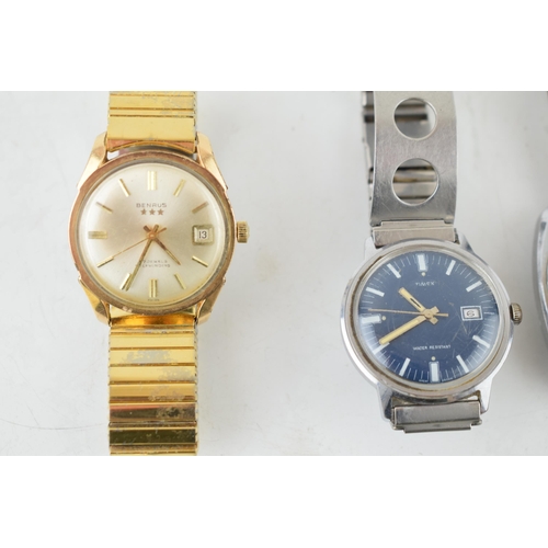 438 - A collection of vintage gentlemen's Timex wristwatches, to include complete watches and a movement. ... 