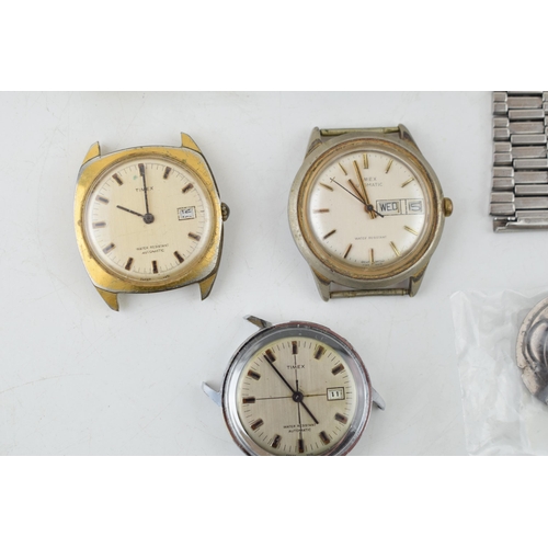 438 - A collection of vintage gentlemen's Timex wristwatches, to include complete watches and a movement. ... 