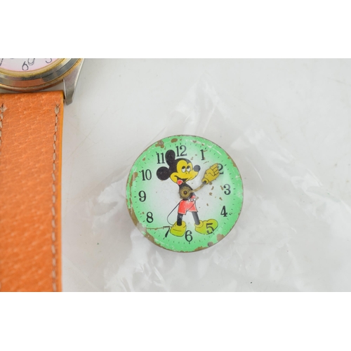 442 - A collection of Disney and similar watches and parts to include examples with Mickey Mouse, Snoopy a... 