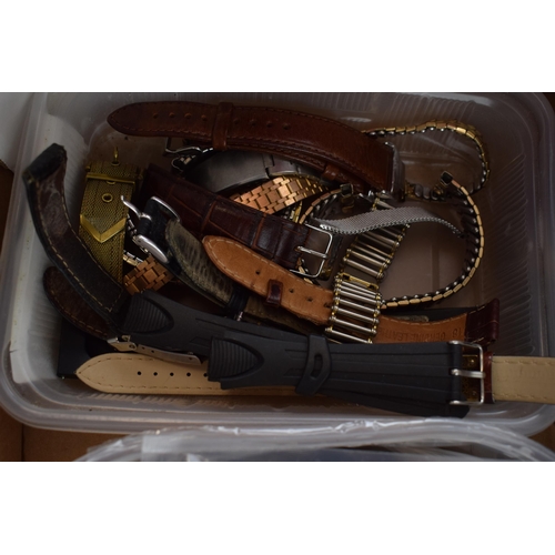 452 - A collection of watch straps, bracelets and buckles together with a watch shop lockable countertop r... 