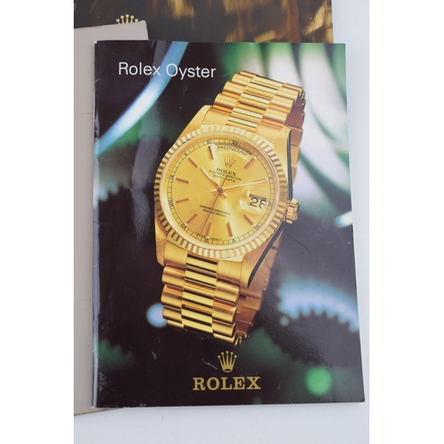 457 - A collection of original Rolex catalogues and dealer publications together with Tudor and Jaeger-le-... 