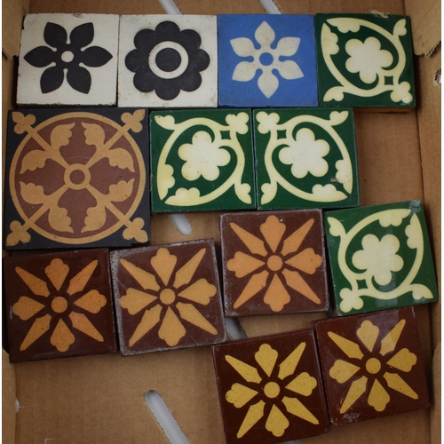 574 - A collection of encaustic tiles by manufactures Minton Hollins, Craven Dunhill & Co and The Campbell... 