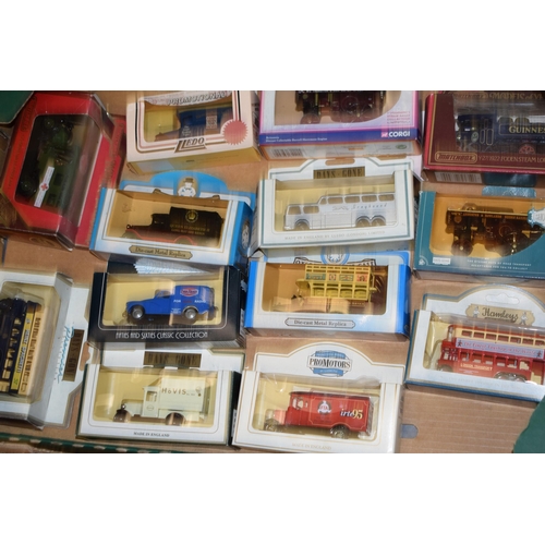 587 - A collection of boxed and unboxed vintage die-cast model vehicles by manufacturers, Corgi, Lledo, Va... 