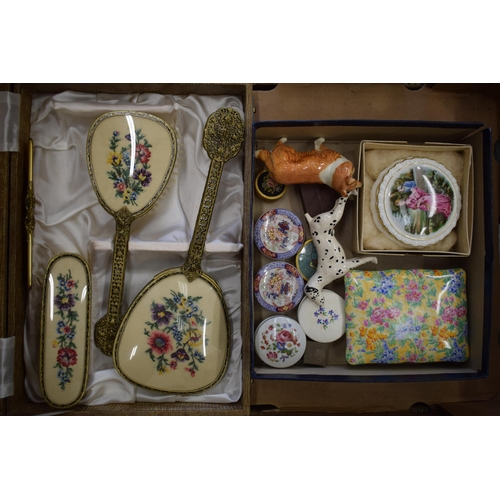 616 - A boxed vintage dressing table set together with a collection of enamel pill boxes, a silver pill bo... 