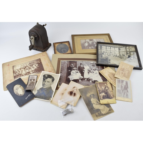 619 - A mixed collection of items to include antique photographs, antique photo frames, a desk pencil shar... 