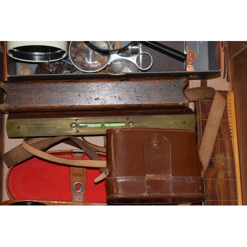 625 - A collection of items to include binoculars, a spirit level in wooden case,  an Aitchison & Co magni... 