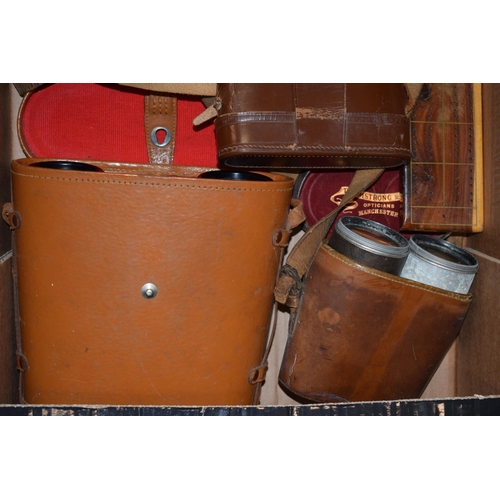 625 - A collection of items to include binoculars, a spirit level in wooden case,  an Aitchison & Co magni... 