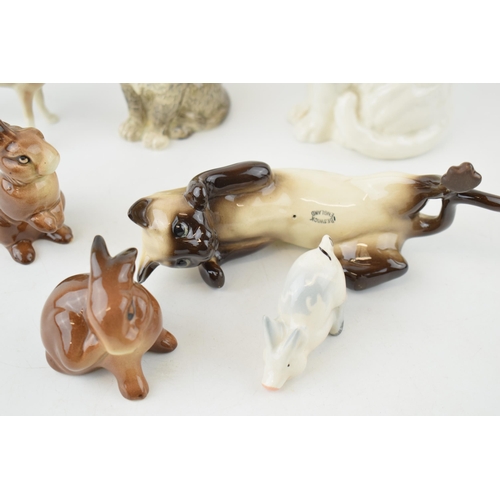 181 - Beswick to include a comical pig, a comical fawn, cats and rabbits (7).