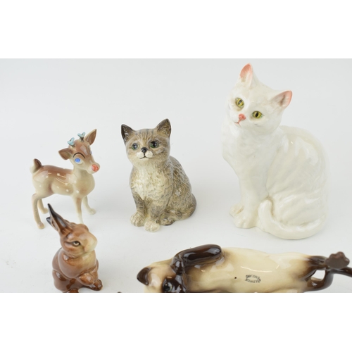 181 - Beswick to include a comical pig, a comical fawn, cats and rabbits (7).