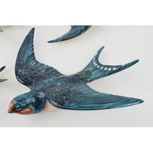 183 - Beswick swallow wall plaques to include 757-1, 2 x 757-2 and a 757-3 (4 - all with damages).