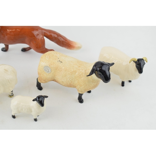 194 - Beswick to include a large standing fox, 2 ewes, a ram and a lamb with a later John Beswick sheep (Q... 