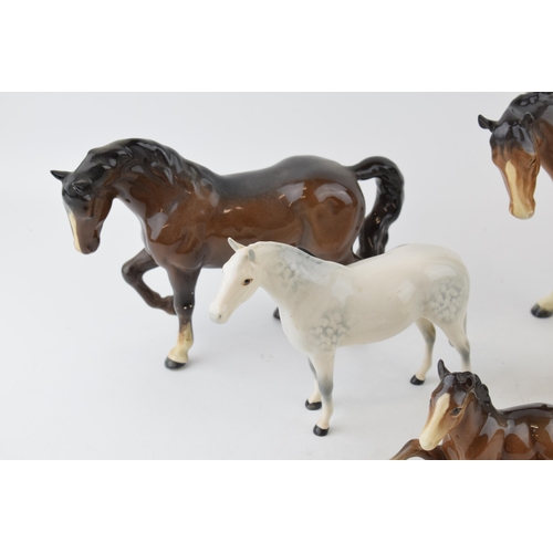 195 - Beswick to include a grey Shetland horse, a grey thoroughbred and 2 other brown horses (4).