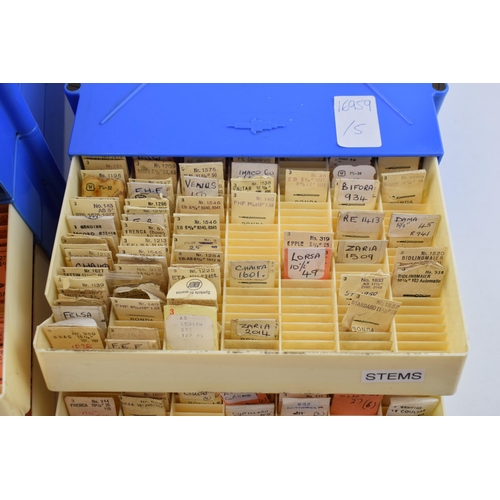 471 - Two plastic trays full of watch stems and staffs for manufacturers such as Kienzle, Citizen, Zenith,... 