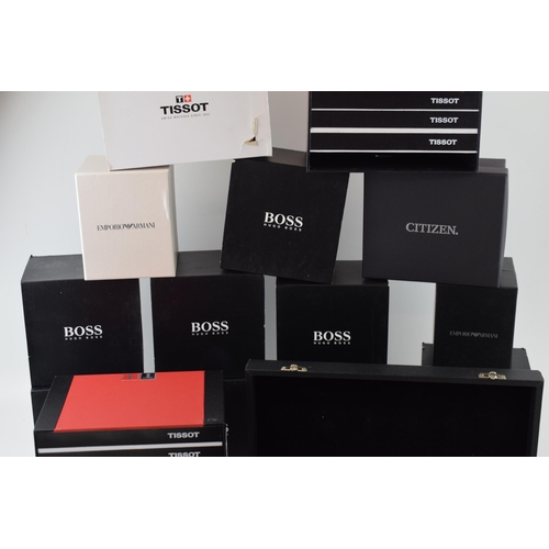 475 - A collection of watch boxes by manufactures Hugo Boss, Tissot and DKNY. (Qty)