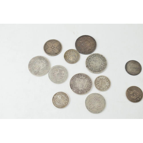 484 - A collection of UK silver coins to include George IV coins, 10.3 grams, William IV examples such as ... 