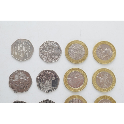 486 - A collection of circulated special edition £2 cons (10) and 50p pieces (10) face value £25.