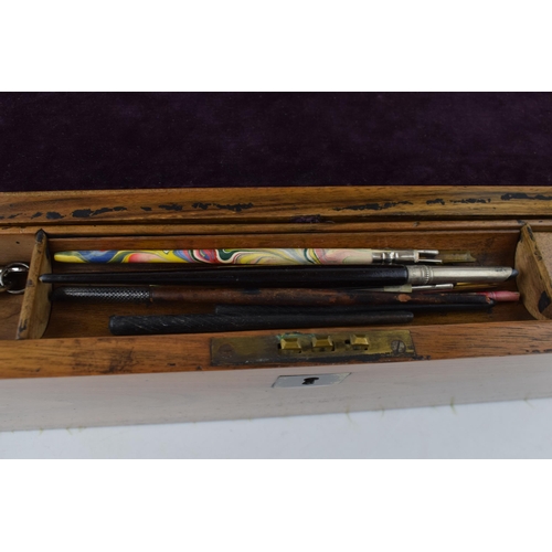 493 - Antique writing slope with original purple velvet writing pad. includes inkwell and calligraphy pens... 