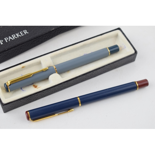 493A - A pair of Parker 95 pens, one ball point and the other a fountain, box, both working (2).