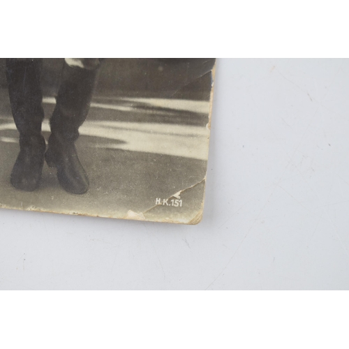 499 - An original WWII era postcard of Adolf Hitler marked to reverse Echo Photographie. Approx 8.5cm x 13... 