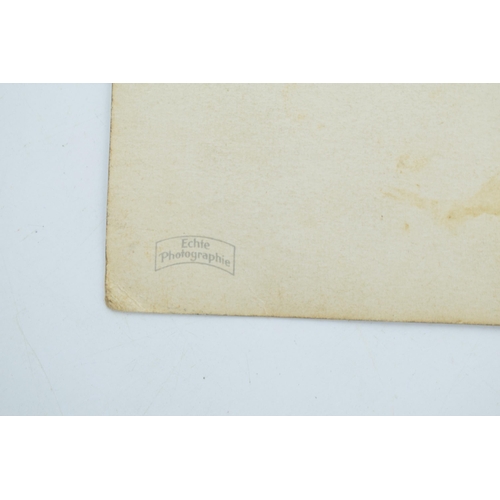 499 - An original WWII era postcard of Adolf Hitler marked to reverse Echo Photographie. Approx 8.5cm x 13... 